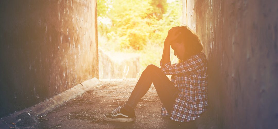 sad woman hug her knee and cry feeling so bad,loneliness,sadness,nobody here.